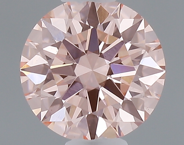 Actual 0.39 carat Fancy Intense Pink Round lab-grown diamond