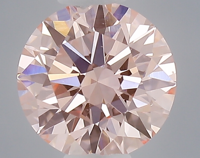 Actual 0.36 carat Fancy Intense Pink Round lab-grown diamond